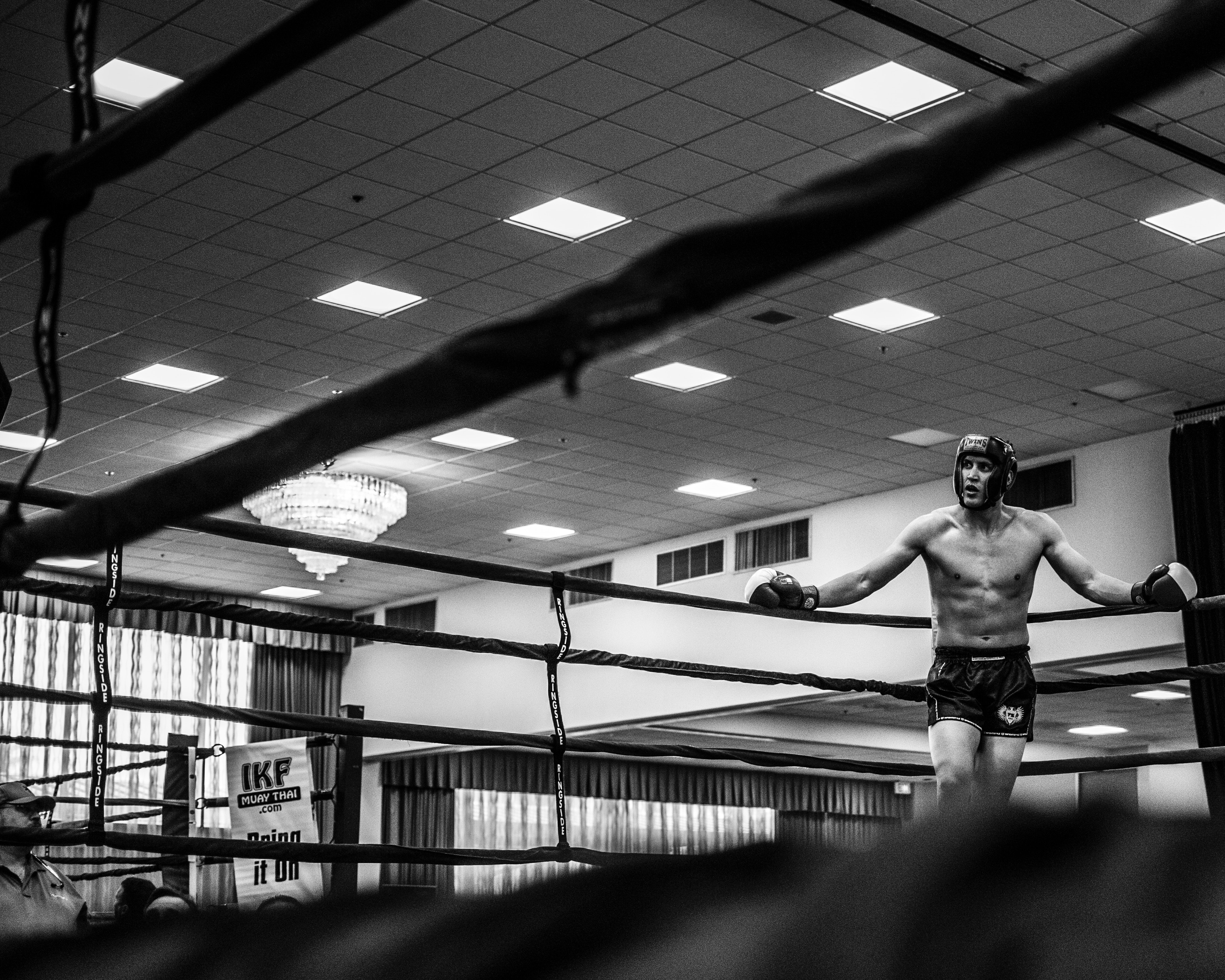 Fighter resting in a boxing ring