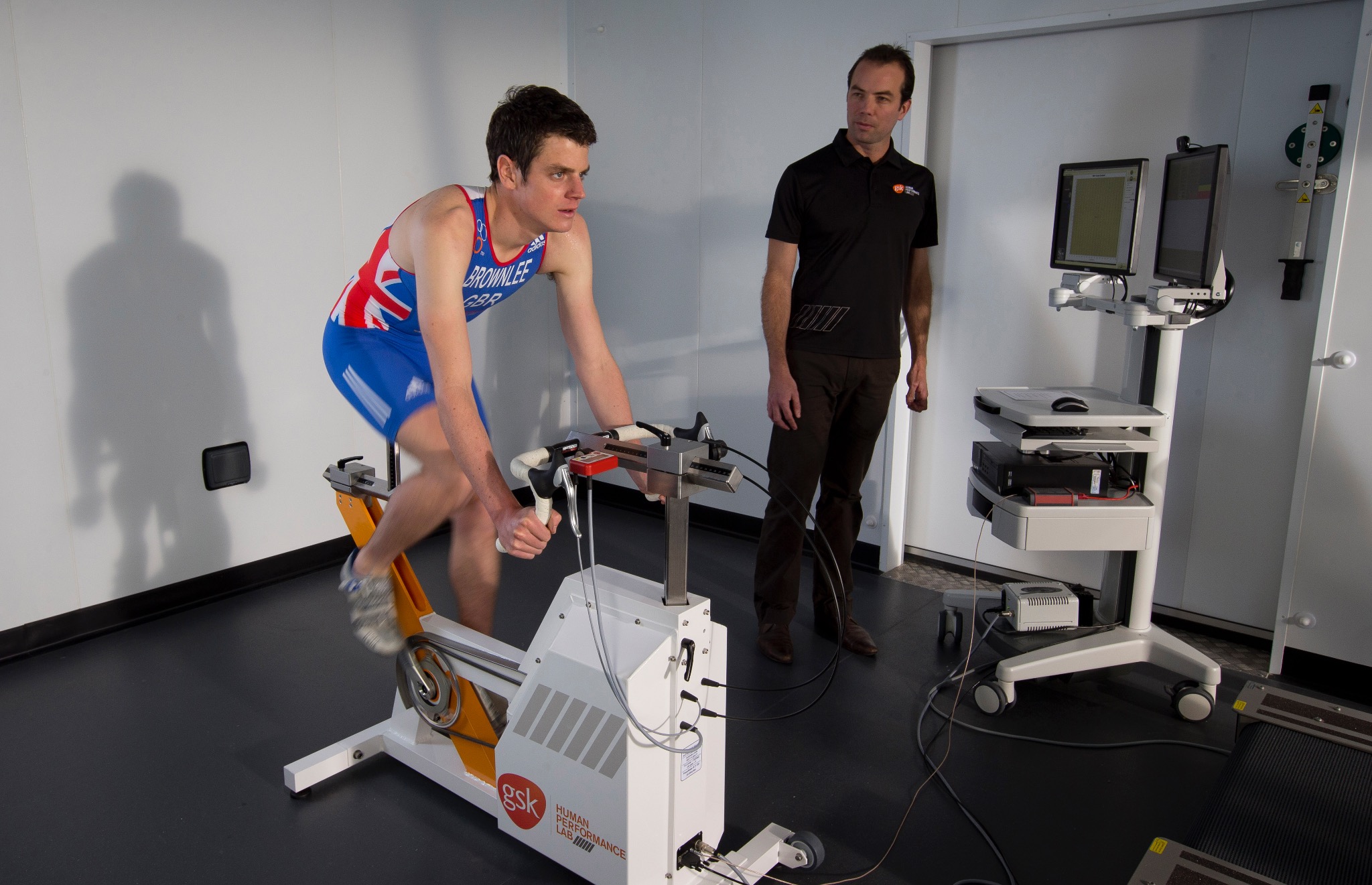 Brad overseeing an athlete on a cycle ergometer